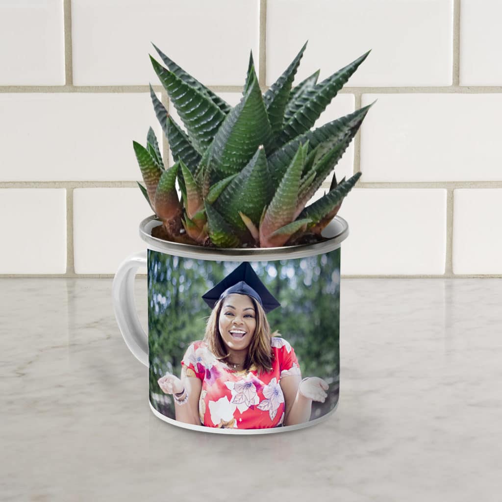 Potted plants in personalized enamel camping mugs