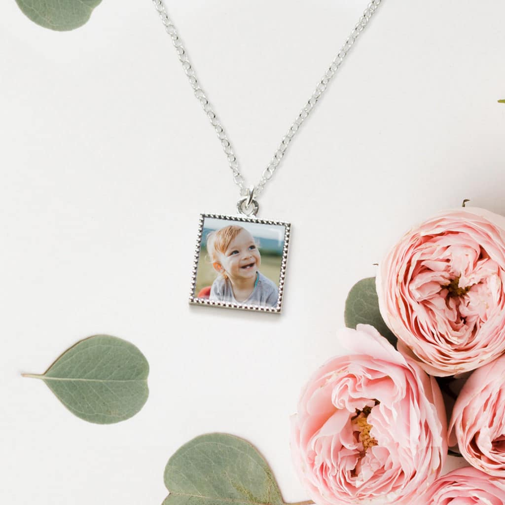 Photo necklace of cute baby