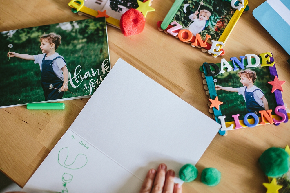 Customizable thank you cards and prints for teachers on a table