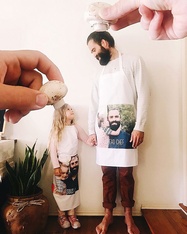 Dad and daughter with photo aprons