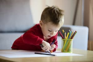 Little boy coloring