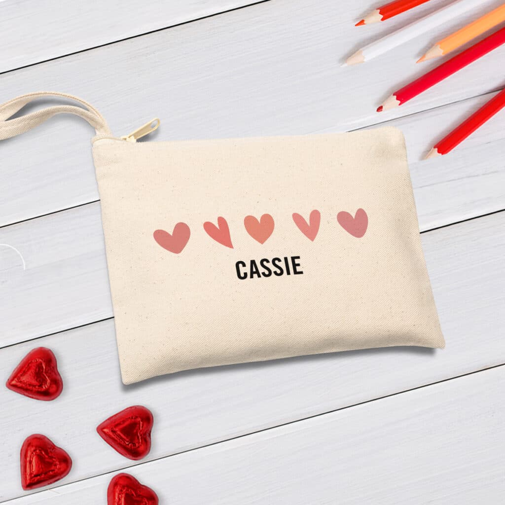 Image of canvas pouch with heart design and first name