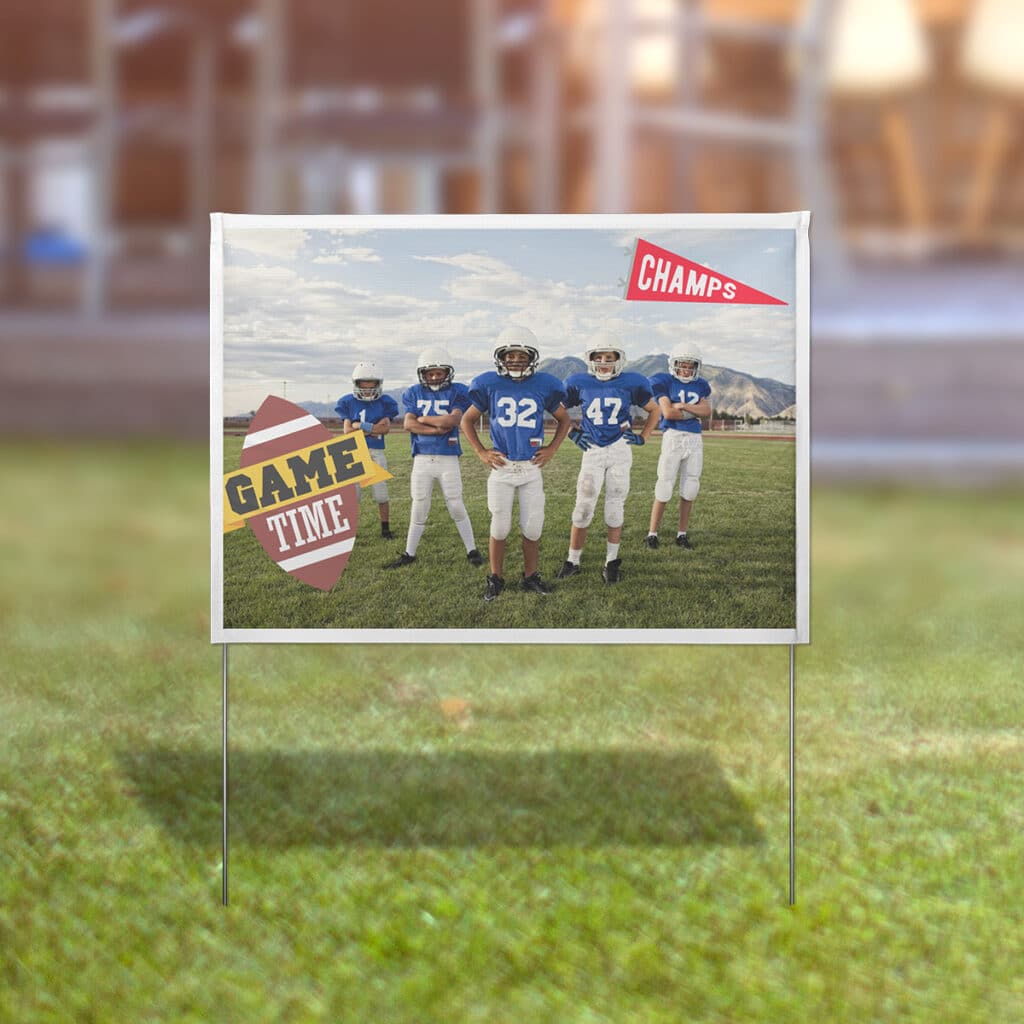 Yard sign featuring football team photo and sports embellishments