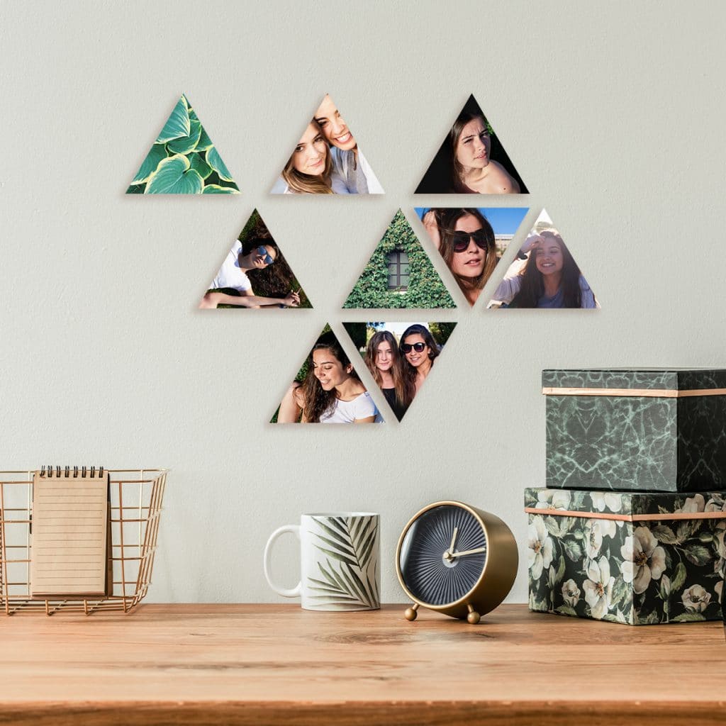 DIY Photo triangles hanging on the wall over a desk