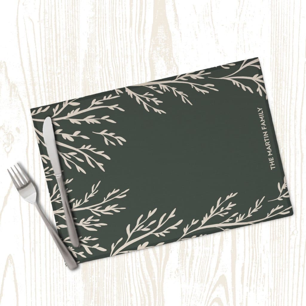 Green placemat with branch design with "The Martin Family" along the side