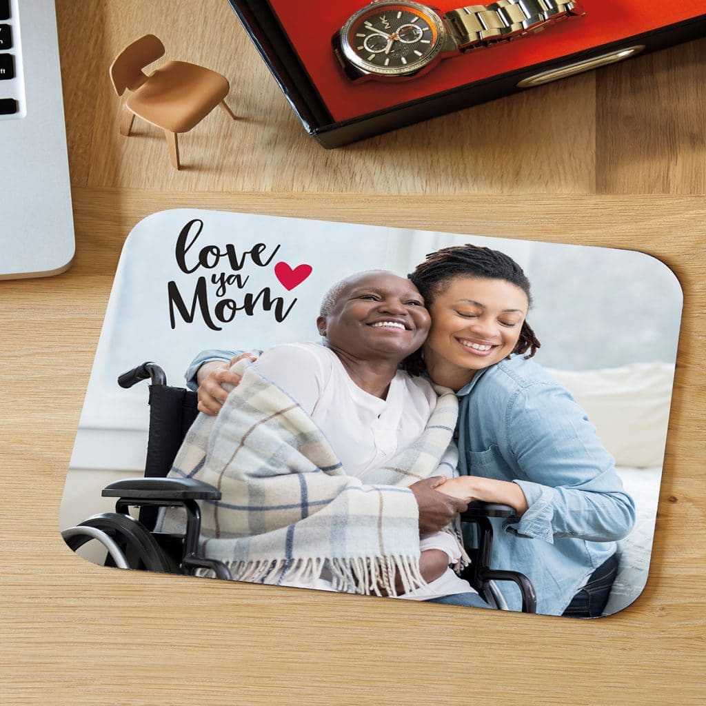 Mousepad featuring photo of mom and daughter hugging with an embellishment that reads "Love you mom"