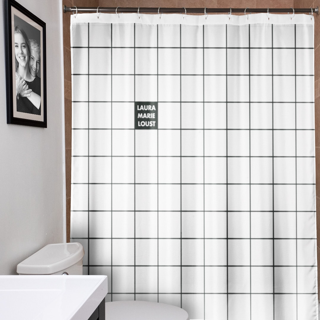 Custom checkered shower curtain hanging in a bathroom
