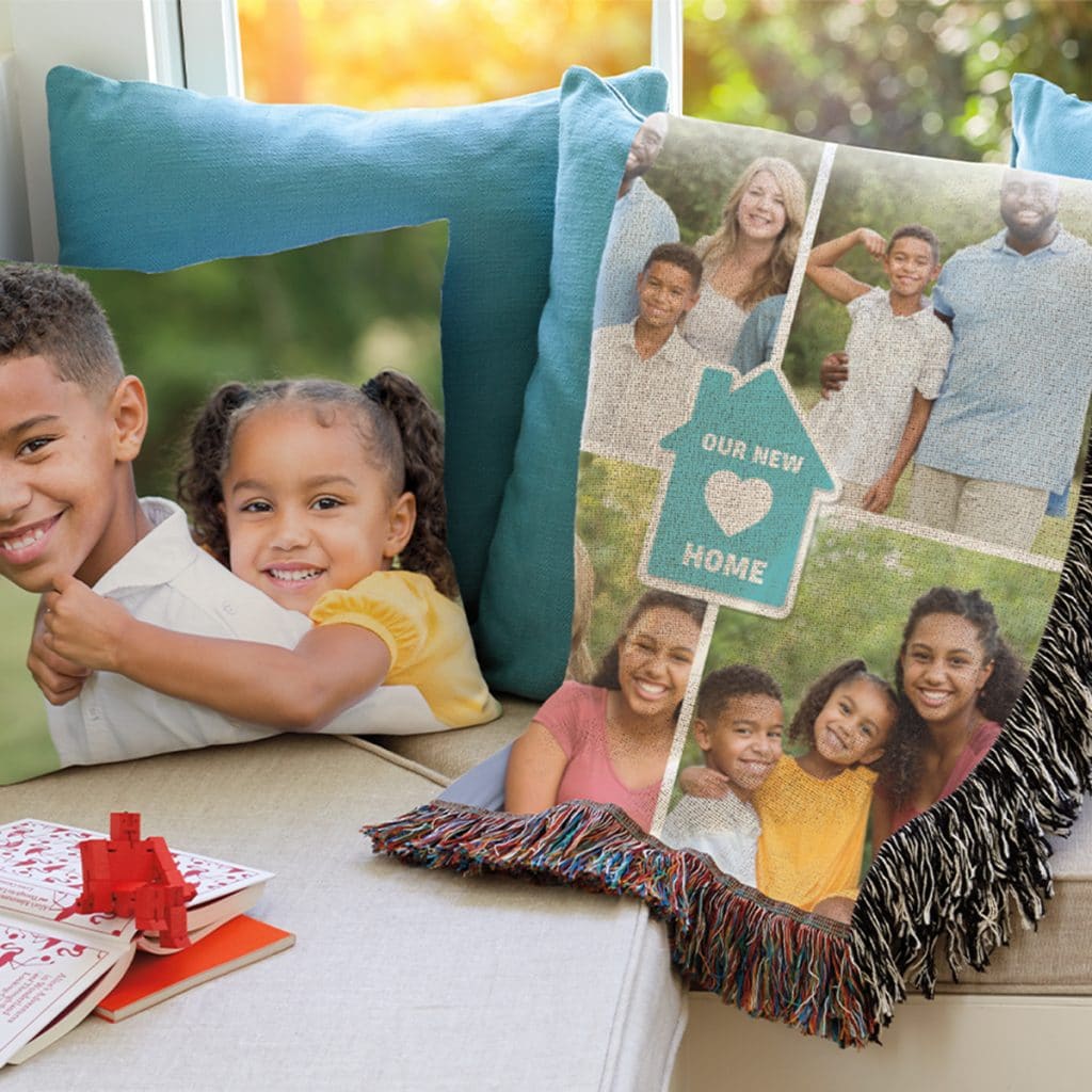 Image showing photo pillow and woven photo blanket laying on a couch