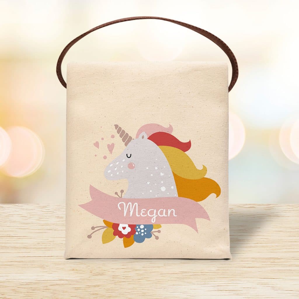Image of a cotton canvas lunch bag with a unicorn design and the name Megan