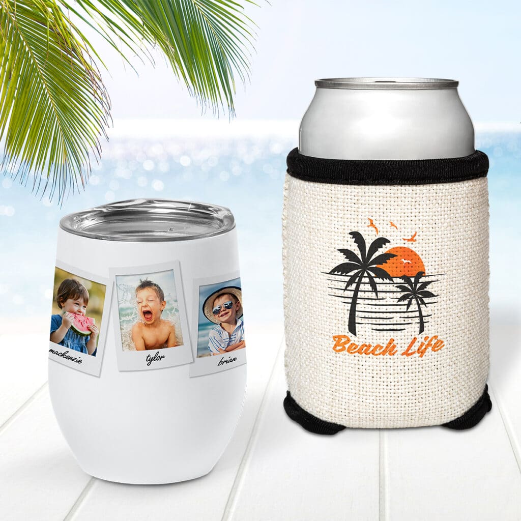Image of insulated wine cup and can with can cooler sitting on a table at the beach.