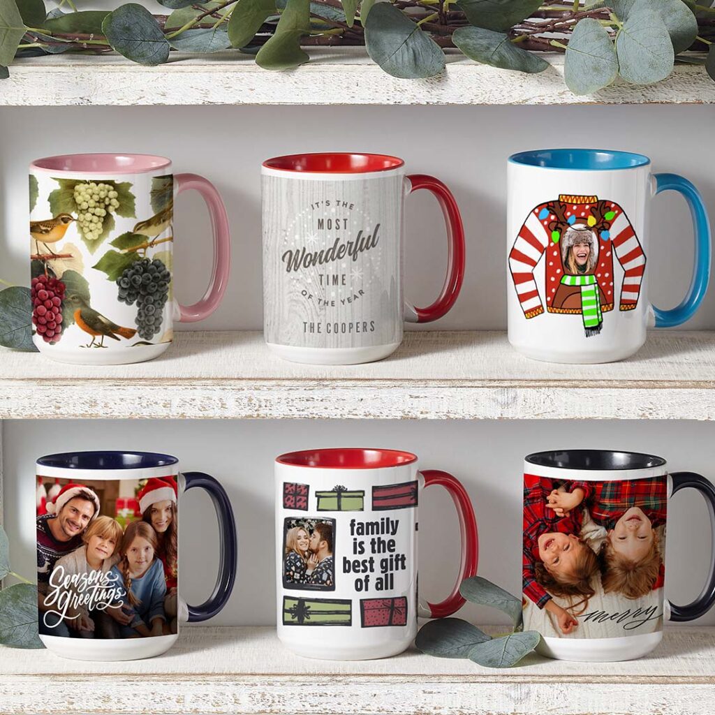 multi-colored christmas mugs on shelf