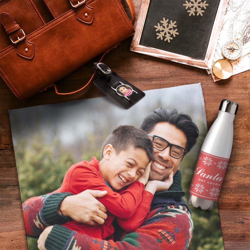 a personalized beach towel, leather luggage label and a customized water bottle