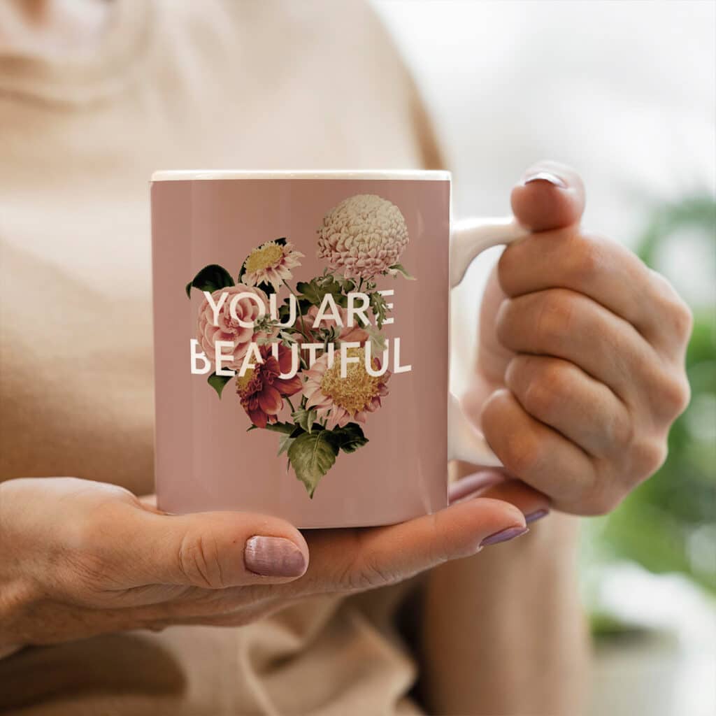 Person holding a Photo Coffee Mug