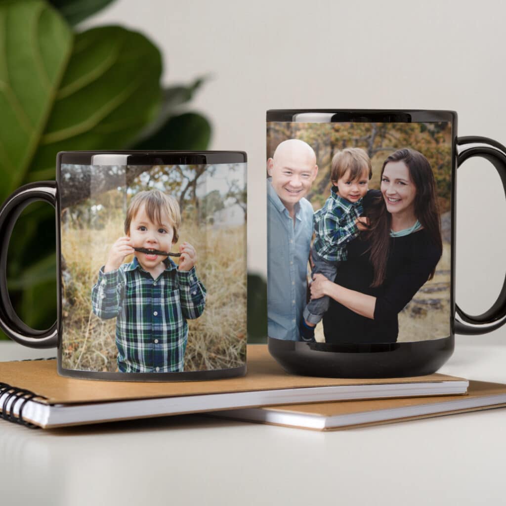 Two photo coffee mugs displayed on a desk